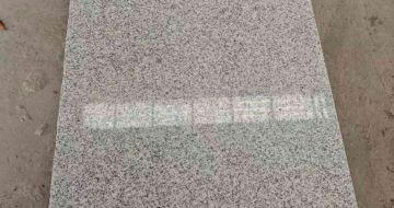 东营芝麻白光面毛板