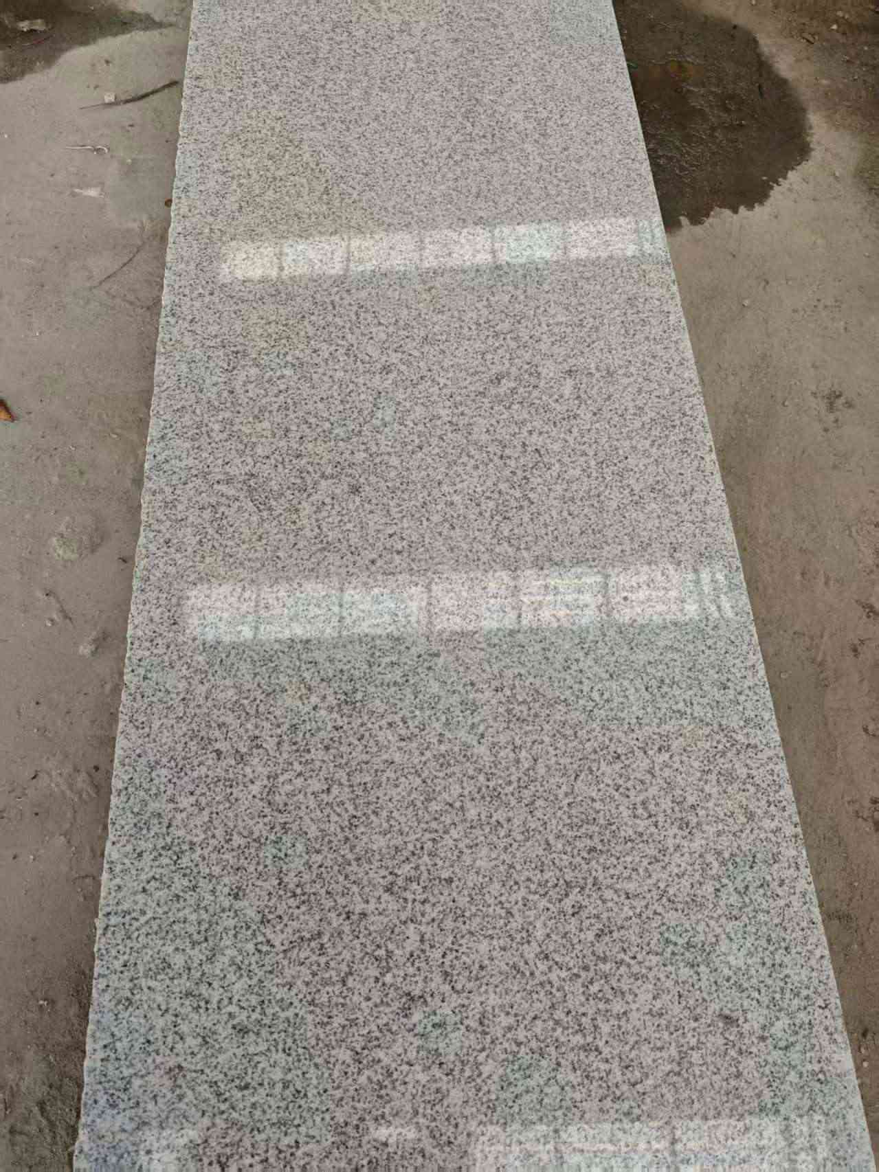 东营芝麻白光面毛板